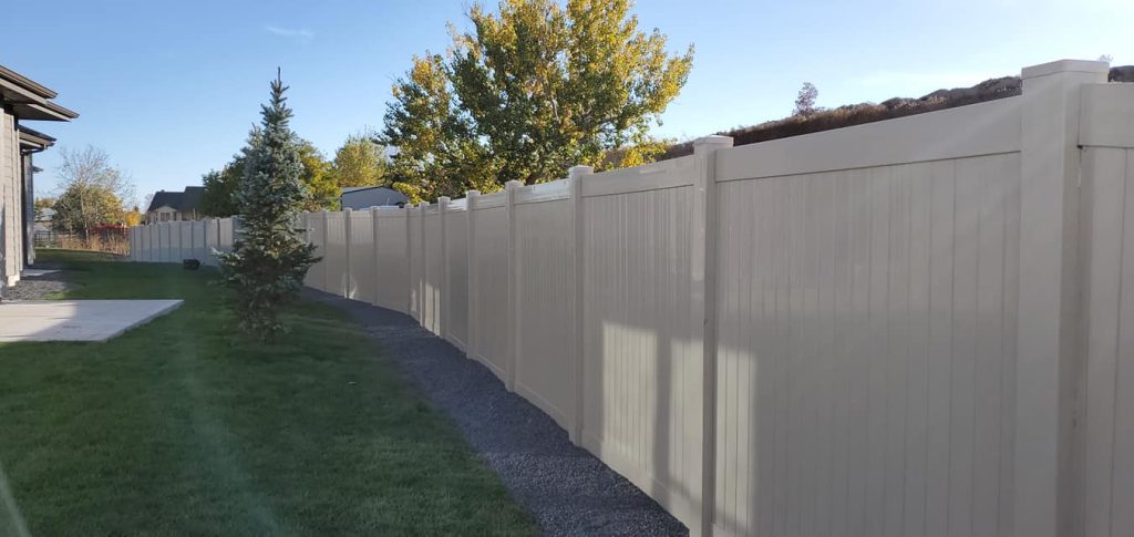 Vinyl privacy fence installation